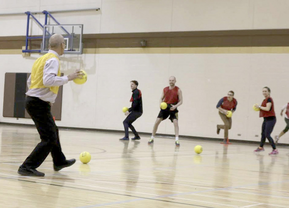 Participants face off in dodgeball action at the Faculty of Kinesiology and Recreation Management staff event fundraiser for Front and Centre on Feb. 11, 2016.