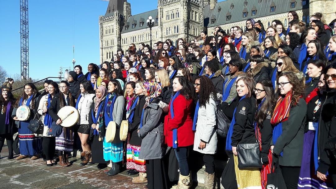 One woman from each of the federal ridings across Canada = 338 incredible, dynamic, strong, resilient leaders. As we filled the House, we have to remember that, in the history of Canada, there have only been 315 elected Members of Parliament who were women. These women were our trailblazers, our mentors, and our Mothers of Confederation. But these inequalities remain. Today, we still make 74% the wages of men. As sisters, we have to use International Women's Day to reflect on our those who paved the way but come together to dismantle patriarchy, sexism, and colonialism /Taylor #umanitoba #umtakeover #daughtersofthevote