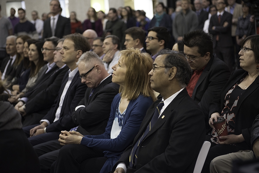 The audience listens to the April 14, 2016 announcement. // Photo by David Lipnowski