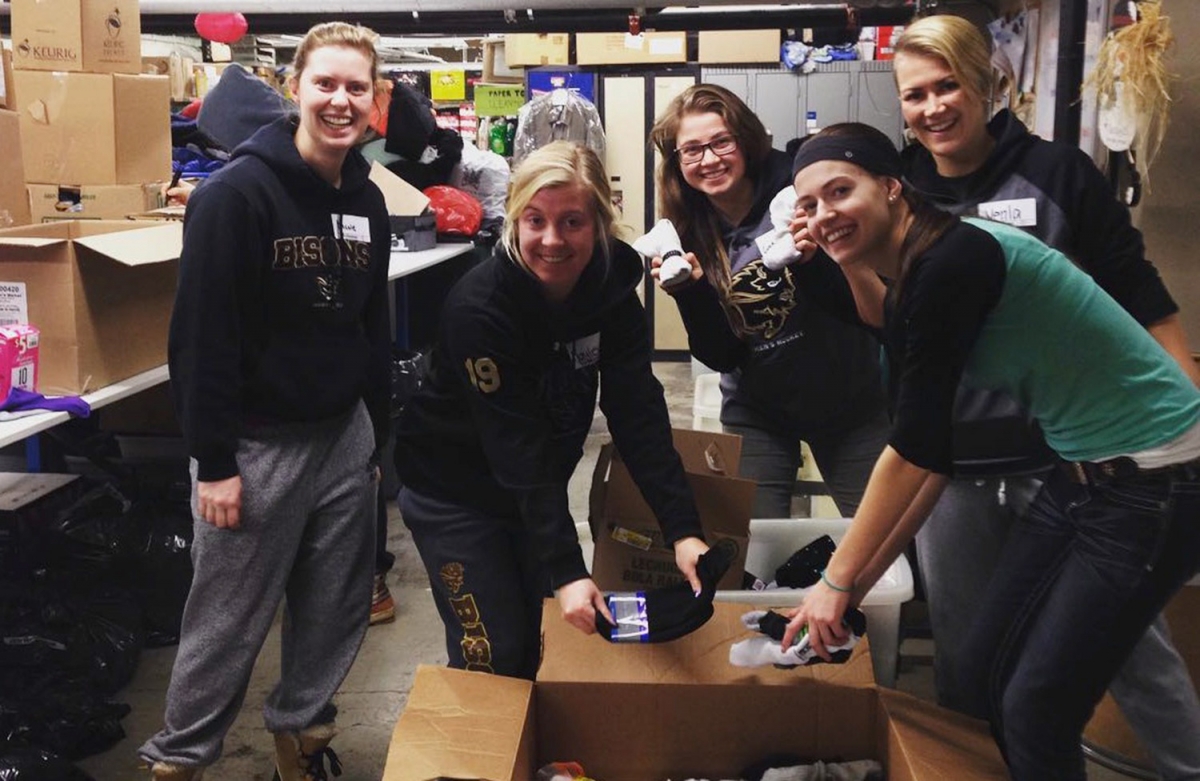 Bison athletes offer help at Siloam Mission in downtown Winnipeg.