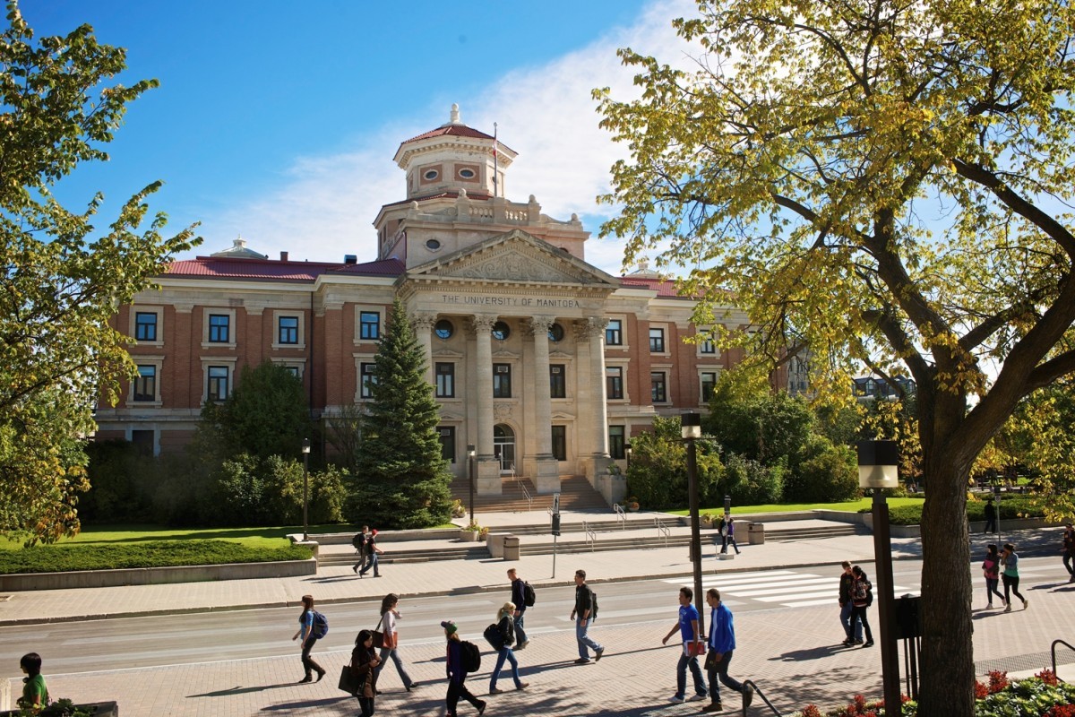 Students walk in front of Administration building