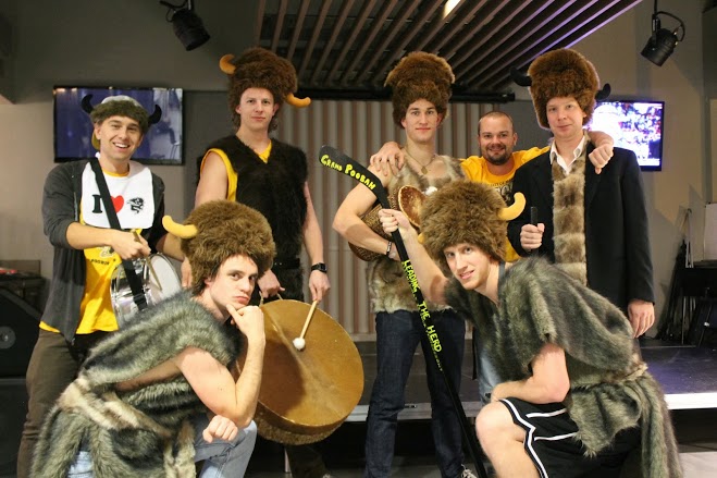 a group of students in fur and bison heads