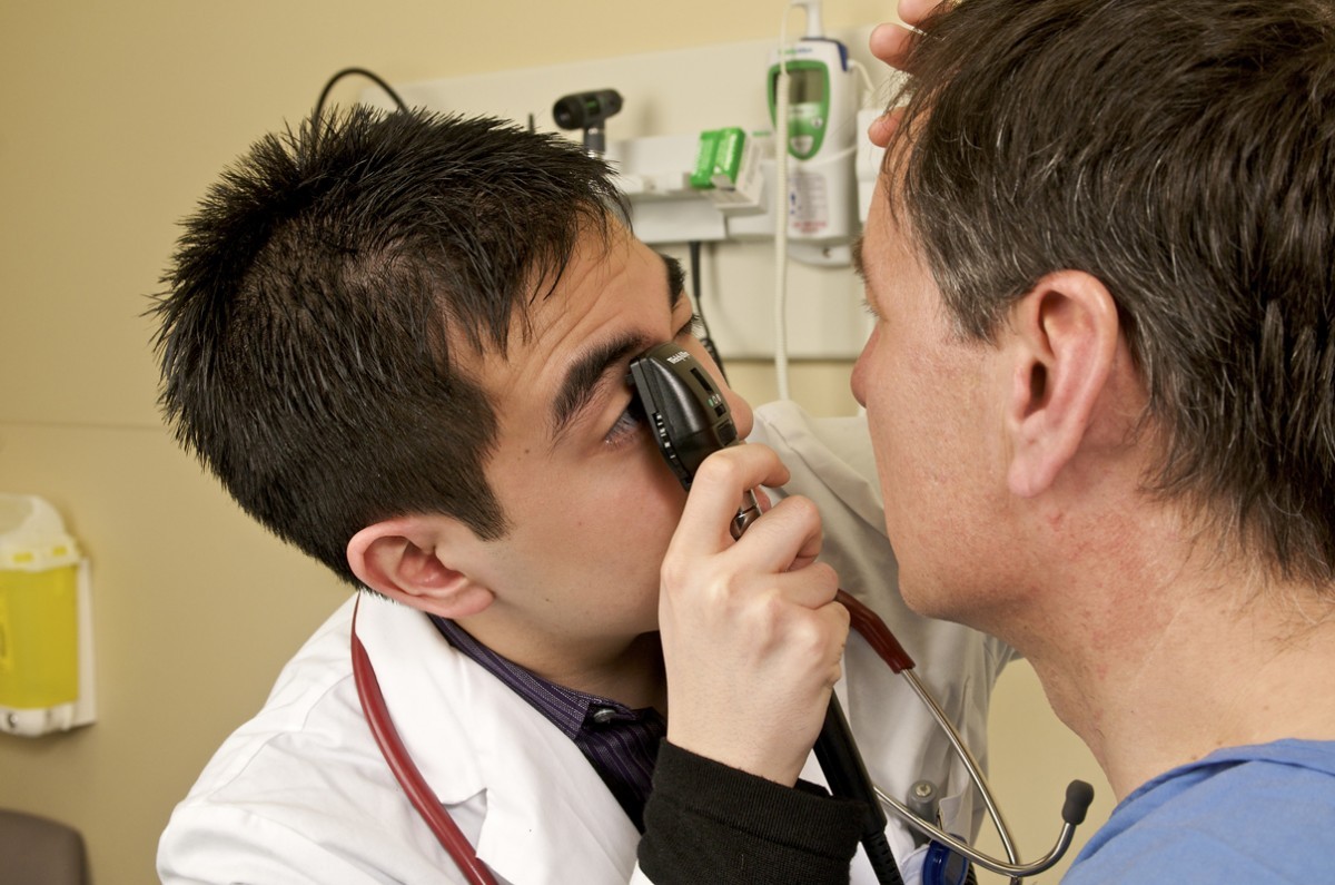 Doctor examining patient