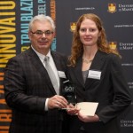 President and Vice-Chancellor, Dr. David T. Barnard awards Andrea Edel with the 1st Place win.