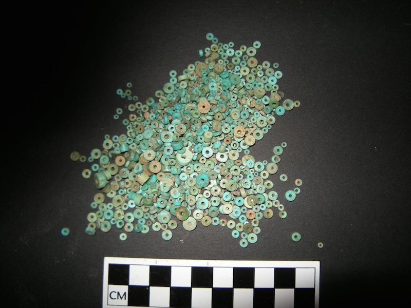 Here, turquoise beads recovered from early excavations at Pueblo Bonito, the largest great house in Chaco Canyon. Credit: Sharon Hull and Mostafa Fayek