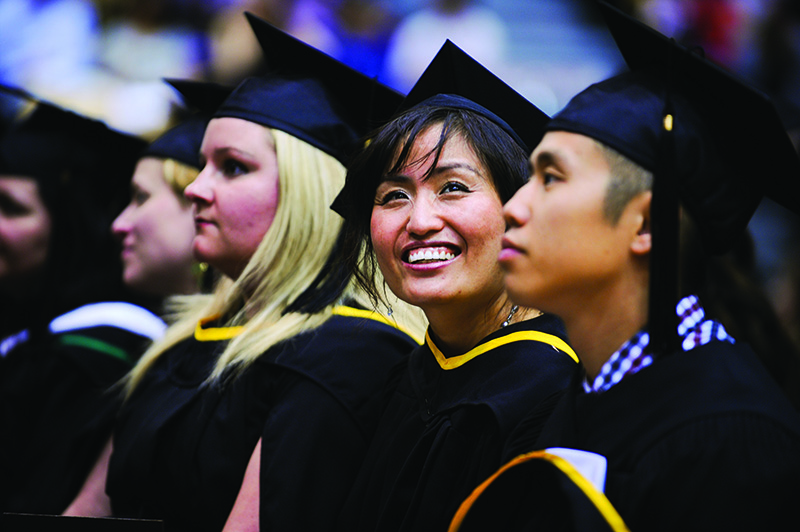 a smiling student at convocation
