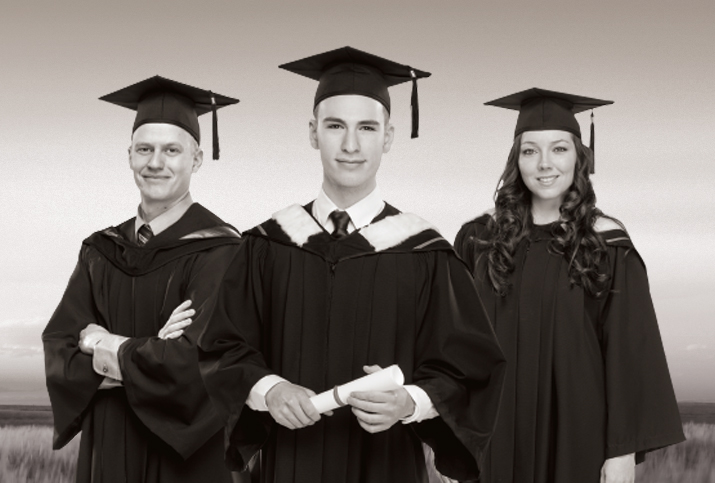 students in grad gowns