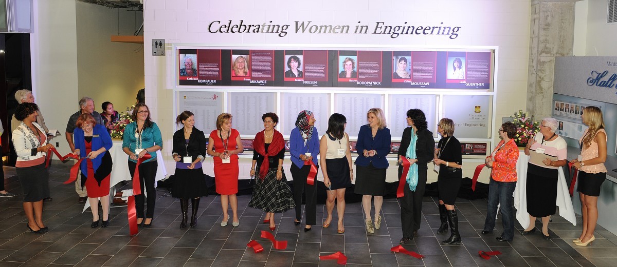 Cutting the ribbon for the Faculty of Engineering's opening of the Celebrating Women in Engineering wall - Homecoming, 2013