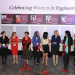 Cutting the ribbon for the Faculty of Engineering's opening of the Celebrating Women in Engineering wall - Homecoming, 2013