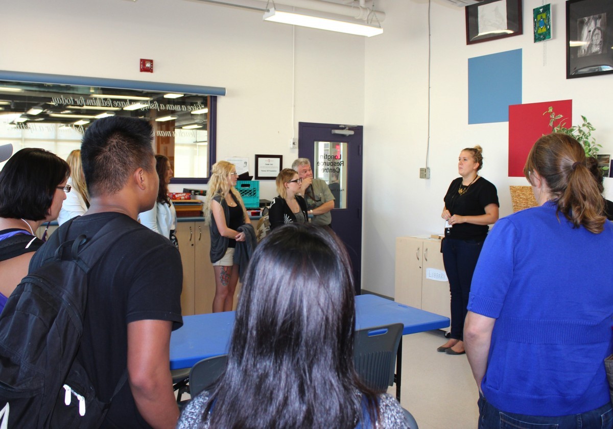 Nursing students tour the art room at Siloam Mission