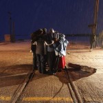 Aboriginal protestors pray at the end of their blockade of a CN railroad track just west of Portage La Prairie, Man., on Wednesday, January 16, 2016. They ended their protest without incident. THE CANADIAN PRESS/John Woods