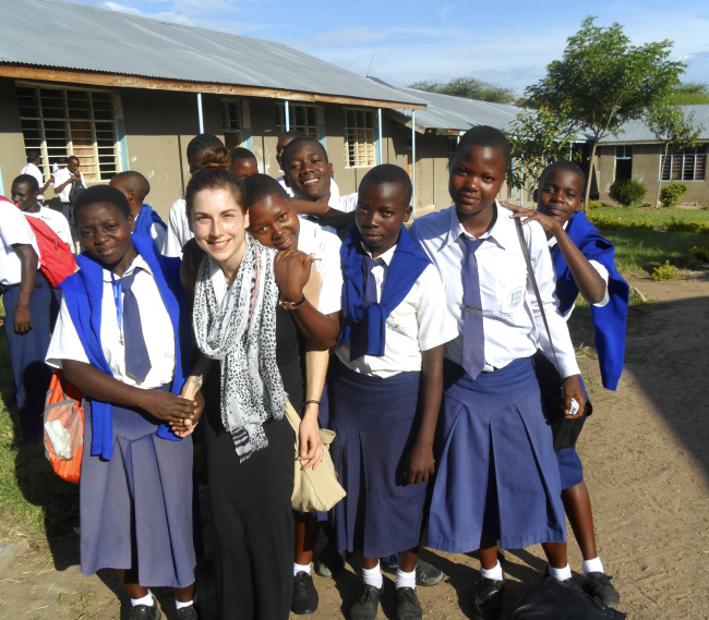 Student Nikki Hawrylyshen with some of the school kids in Tanzania.