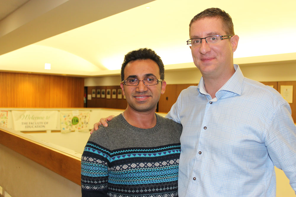 Arsham Parsi (left) with Robert Mizzi, assistant professor in the department of educational administration