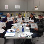 A group finishing the Community Tables program, which provides training in basic nutrition, food safety, and traditional Indigenous foods with an urban focus.