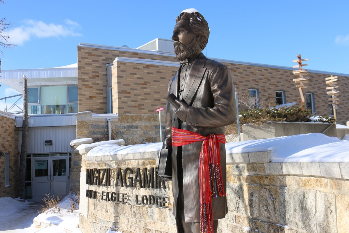 THE STATUE OF LOUIS RIEL, ADORNED WITH A SASH BY THE MÉTIS UNIVERSITY STUDENTS ASSOCIATION