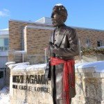 THE STATUE OF LOUIS RIEL, ADORNED WITH A SASH BY THE MÉTIS UNIVERSITY STUDENTS ASSOCIATION