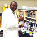 Rotimi Aluko working in the lab