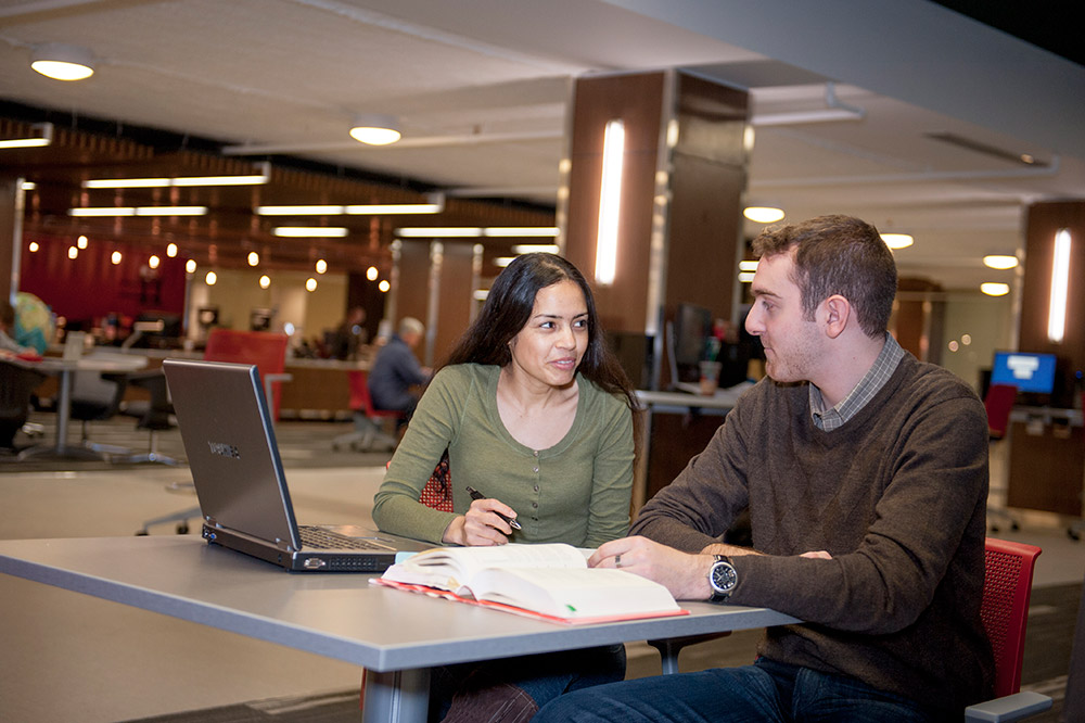 Students working in the Elizabeth Dafoe Library