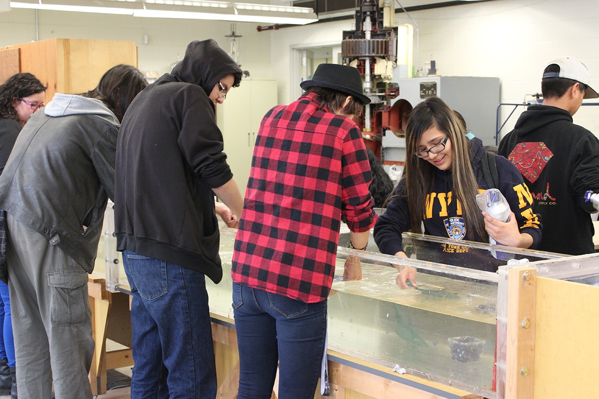 High school students from the Indigenous post-secondary leadership club participating in the engineering lab activity