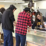 High school students from the Indigenous post-secondary leadership club participating in the engineering lab activity