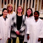 Dr. Annemieke Farenhorst (centre) shares her passion for science with high school students.