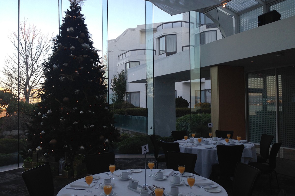 Tables are set prior to the alumni gathering in Victoria