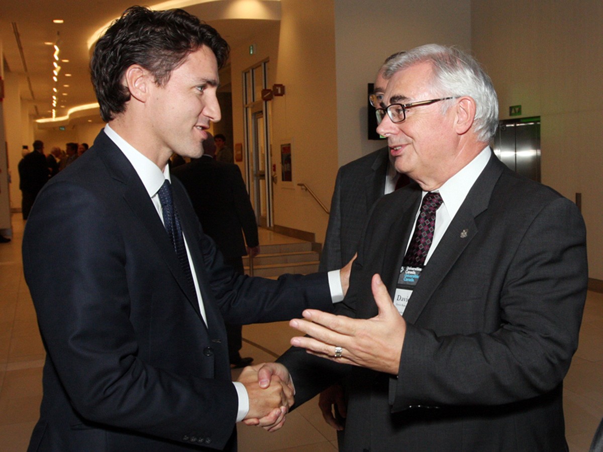 Prime Minister Justin Trudeau and University of Manitoba President David Barnard are shown in a file image.