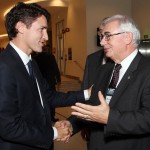 Prime Minister Justin Trudeau and University of Manitoba President David Barnard are shown in a file image.