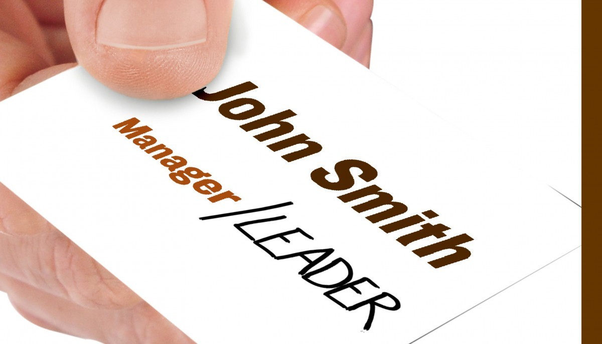 Business card that says "Manager/Leader"