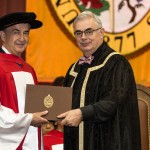Honorary degree recipient Gerald Schwartz (left) and President David Barnard (right) at May 2016 Convocation. // Photo by Mike Latschislaw