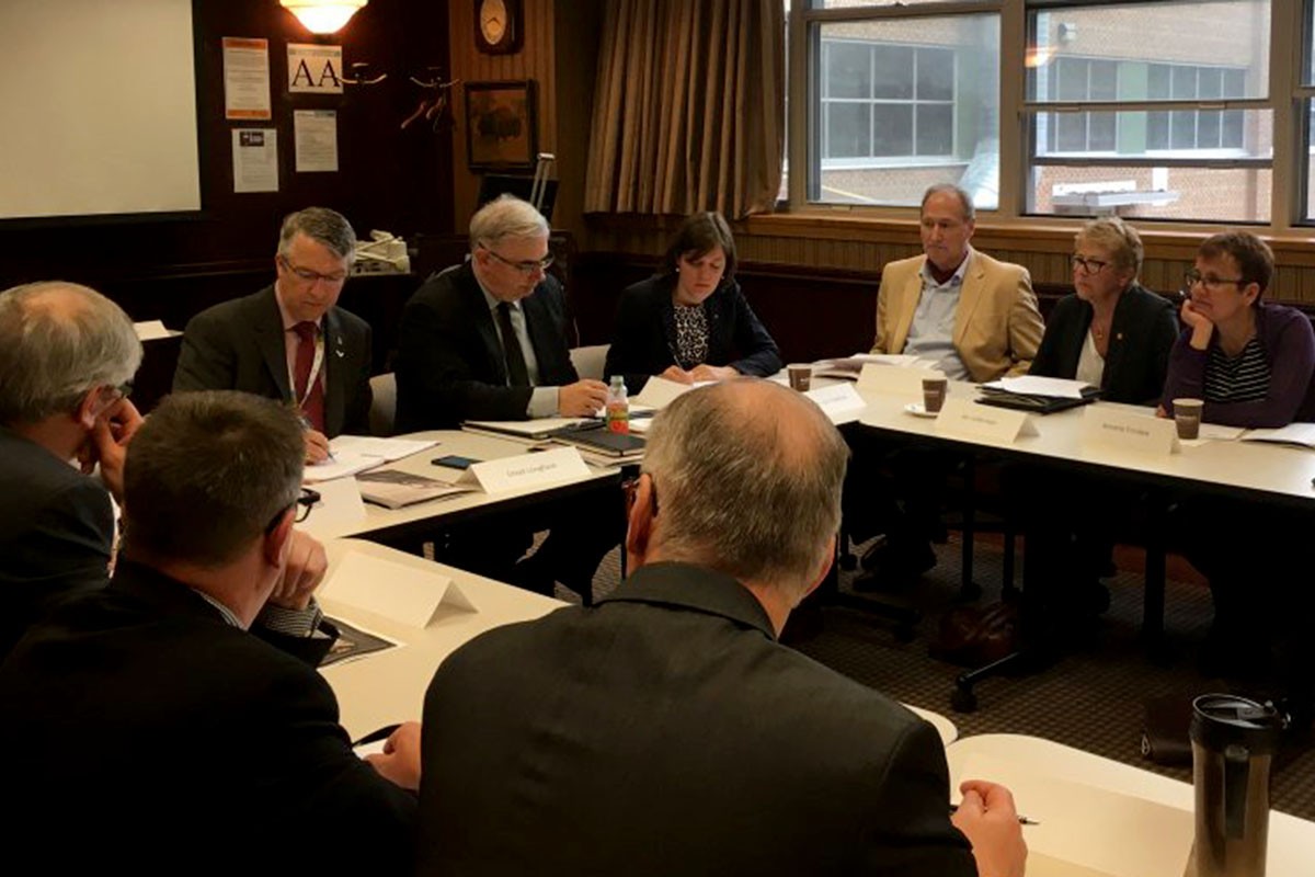 The Liberal Innovation and Post-Secondary Education Caucus meets representatives from Manitoba’s colleges and universities, including President Barnard (top row, second from left) centre), along with industry and technology representatives on May 27, 2016.