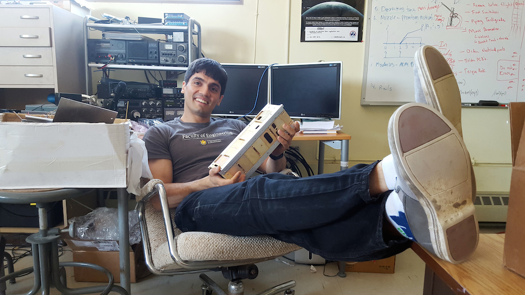 Ahmad Byagowi grinning with the satellite