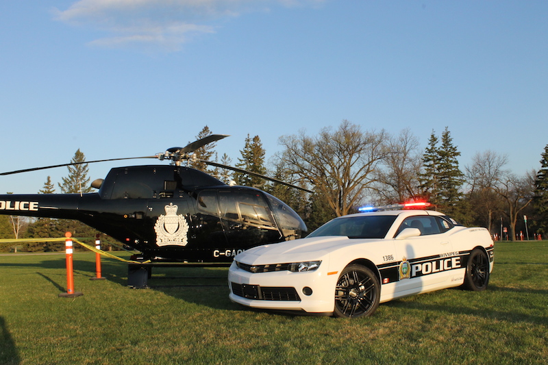 Winnipeg Police helicopter and police car