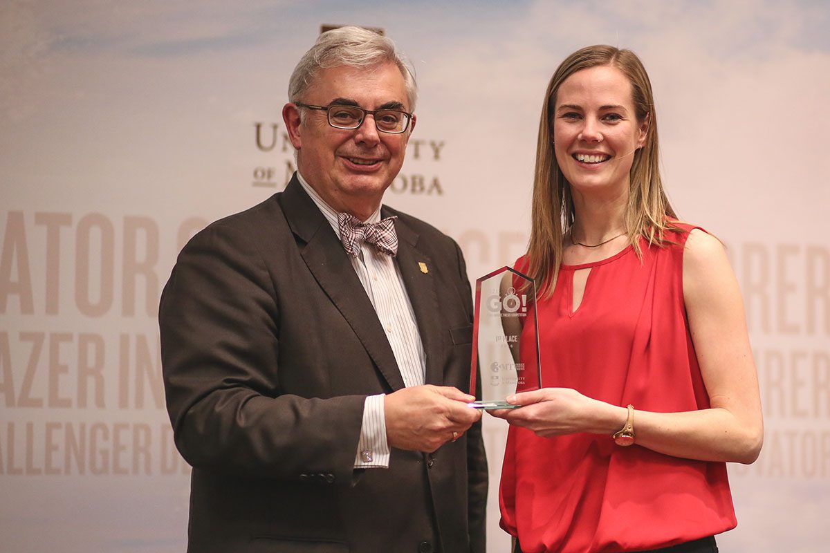 (L-R) U of M President David Barnard and the 2016 3MT winner Karlee Dyck.