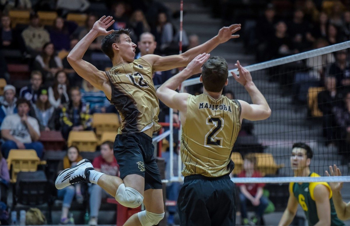 MANITOBA BISON VOLLEYBALL'S DUSTIN SPIRING and LUKE HERR. THE BISON MEN ARE CURRENTLY RANKED #1 IN CANADA IN USPORTS // PHOTO BY JEFF MILLER