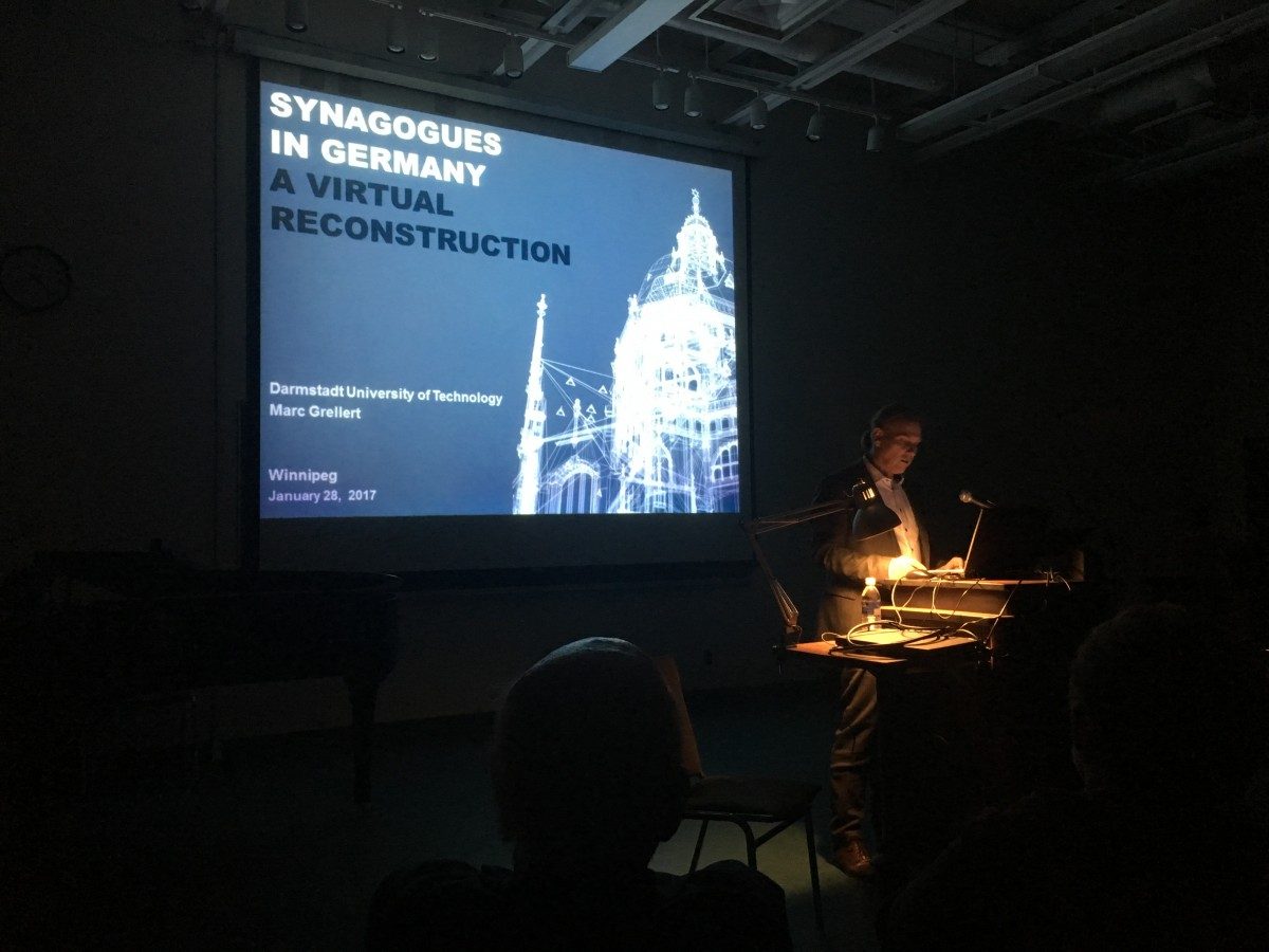 Marc Grellert gives the opening lecture for the Synagogues in Germany exhibit