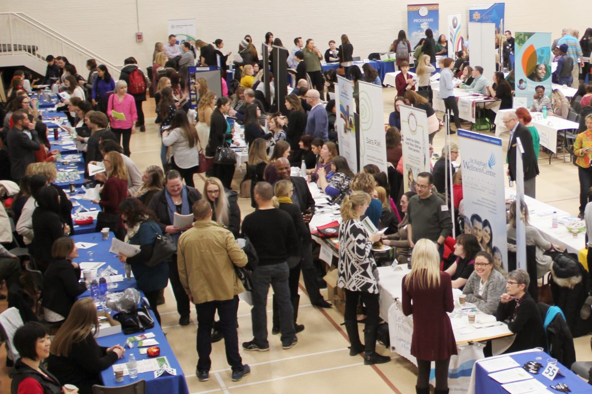 Social Work students meet with community agency representatives during Field Information Day.