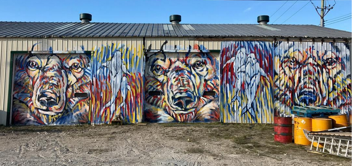 Alum Kelsey Elaisson painted this mural in Churchill / Photo: Instagram, @seawalls_