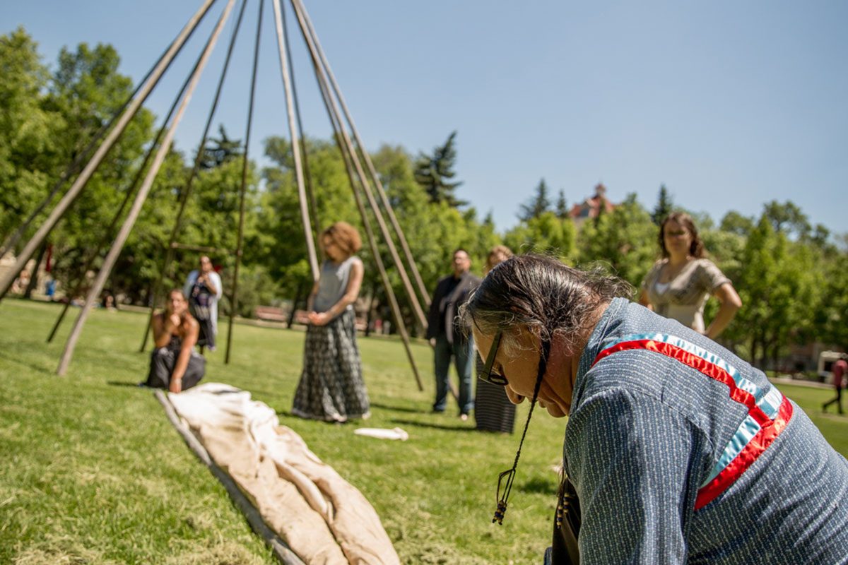 The teepee raising in June 2016 on Fort Garry campus.