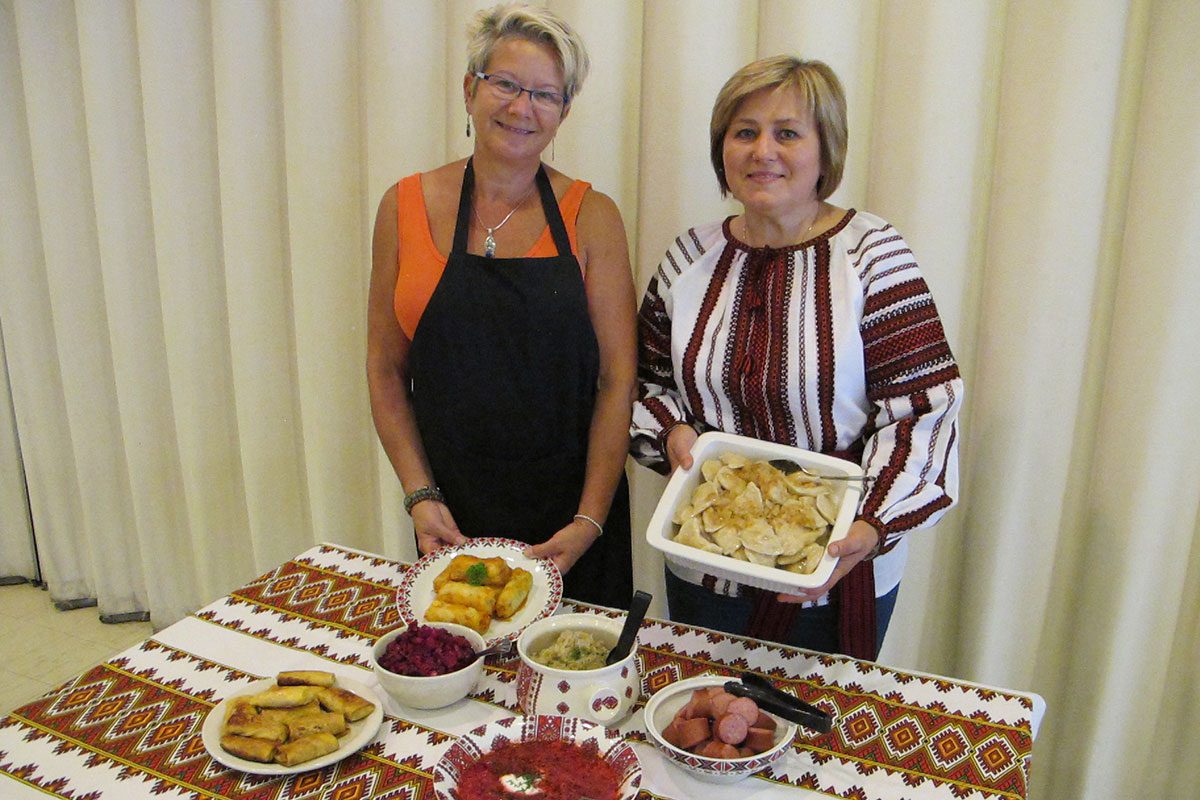 Denise Friesen and Halyna Statkevych with their dishes for the Ukrainian Lunch at St. Andrew's College during Homecoming.