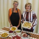 Denise Friesen and Halyna Statkevych with their dishes for the Ukrainian Lunch at St. Andrew's College during Homecoming.
