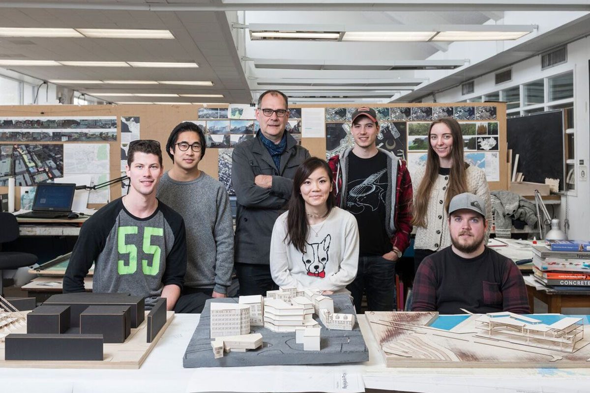 Architecture professor Herb Enns with students. // Photo by David Lipnowski