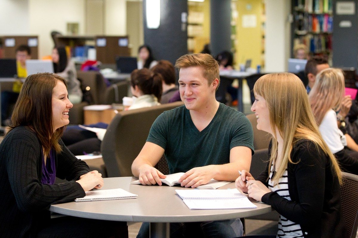 Students in a group studying in the Elizabeth Dafoe Library