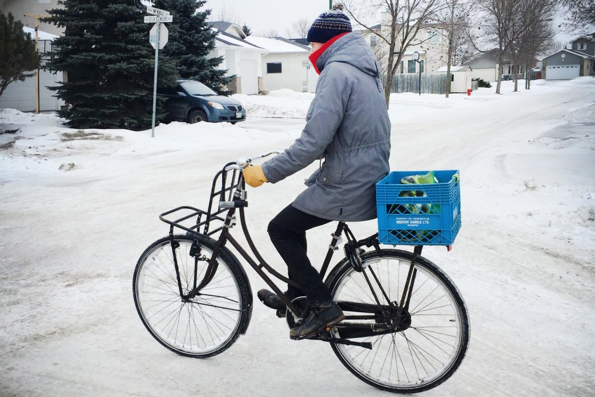 U of M student, Daniel Reihl, cycles to and from campus in the winter.