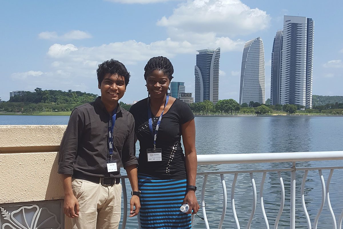 (L-R) Zaman Wahid (computer engineering student at Bangladesh University) and Mercy Oluwafemi (U of M psychology student) in front of ACU.