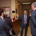 Dr. Aaron Kim, Associate Dean of Clinics, guides representatives from Scotiabank on a tour of the College of Dentistry's Patient Care Clinic on Jan. 15, 2018.