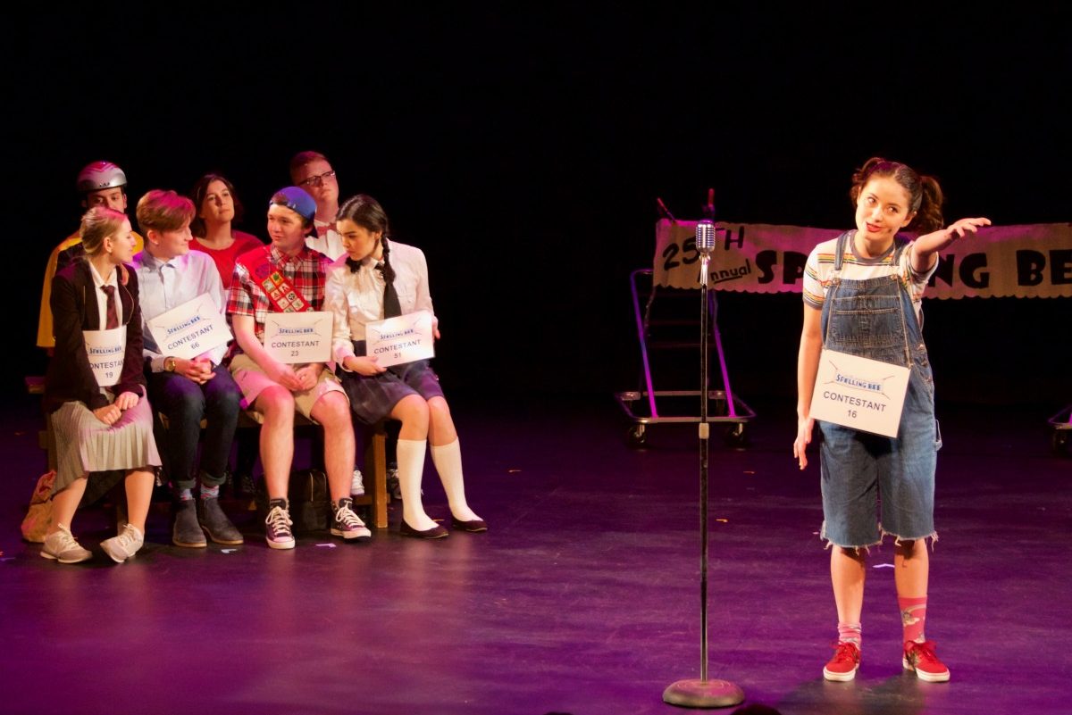 Students singing in musical performance