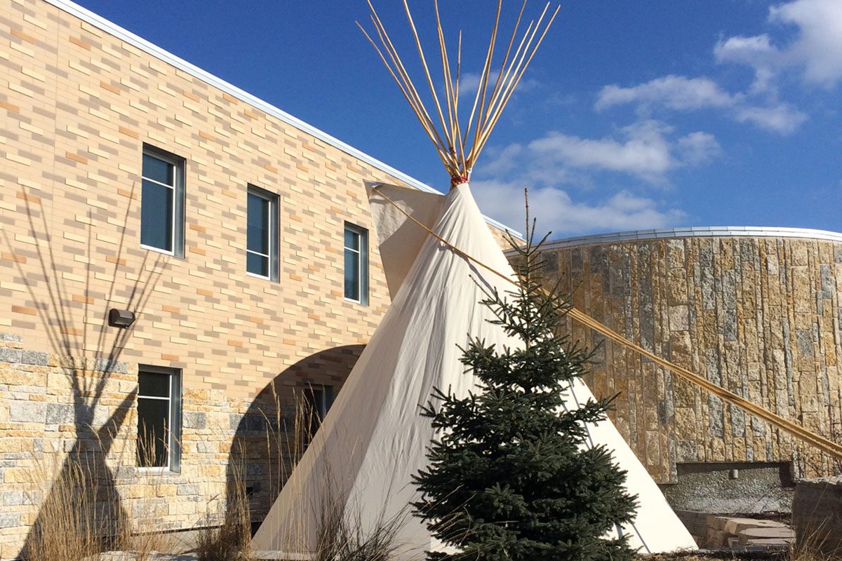 A teepee outside of Migizii Agamik – Bald Eagle Lodge at the Fort Garry Campus.