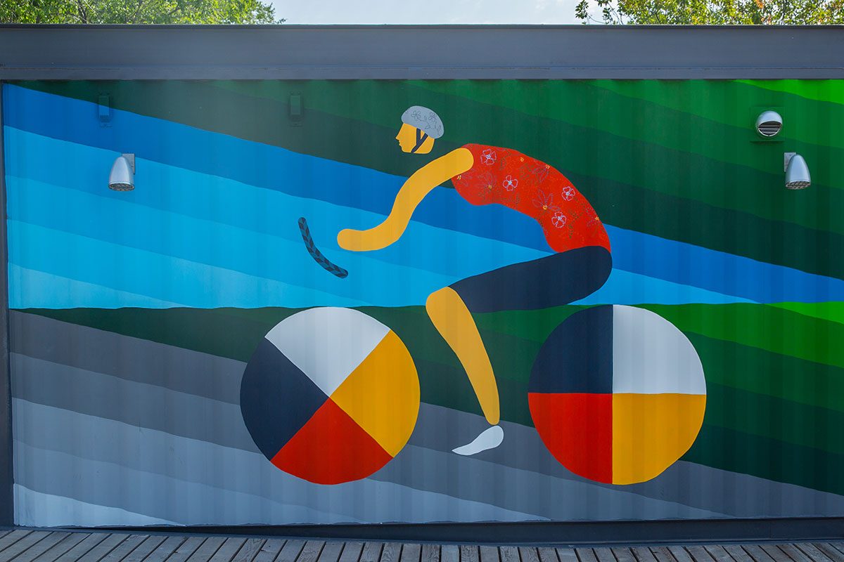 UMCycle mural on Fort Garry Campus by Indigenous artists Dee Barsy and Kenneth Lavallee.