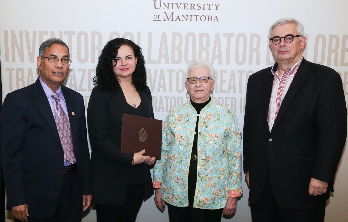 Left to right, Dr. Digvir Jayas, Vice President (Research & International) stands with Dr. Mary J. Shariff, Associate Professor, Faculty of Law, Dr. Juliette (Archie) Cooper, Chair of the Winnipeg Rh Institute Foundation Board, and Dr. David Barnard, President and Vice Chancellor, University of Manitoba.